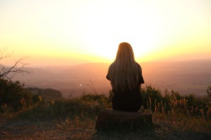 Hope - Young lady viewing horizon.