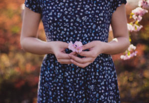 Article The Fruit of the Spirit - young lady holding small flowers