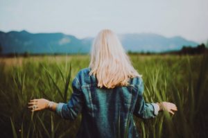 Woman has hope walking around meditating.